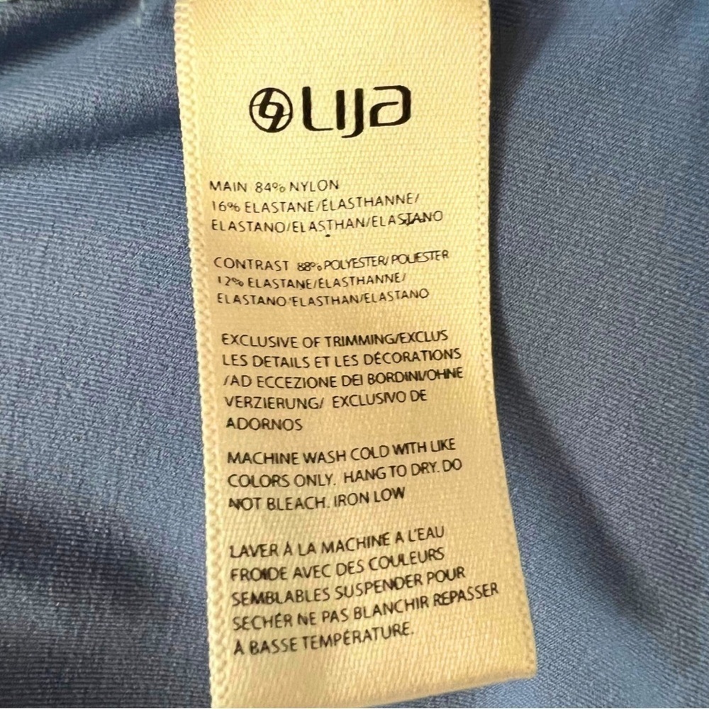 Lija (Small - EUC] 12” blue tennis skirt with ruffle bottom, attached shorties - Picture 7 of 8